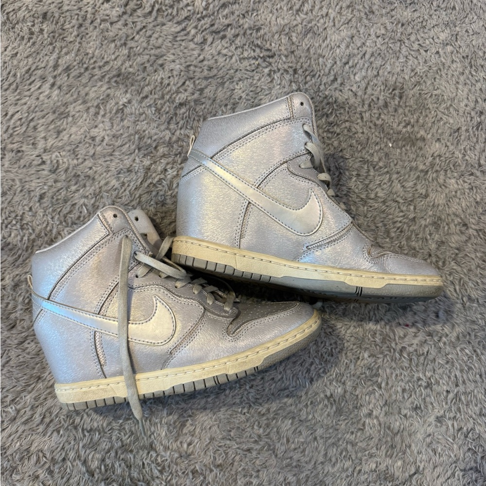 Nike Women's Metallic Silver Hi Top Sneakers (lifted heal)